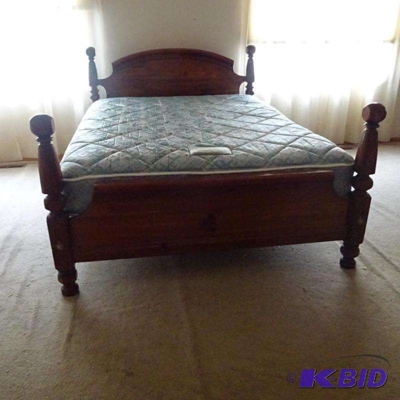 lot 59 image: Wood head board and box spring. Metal frame. ...