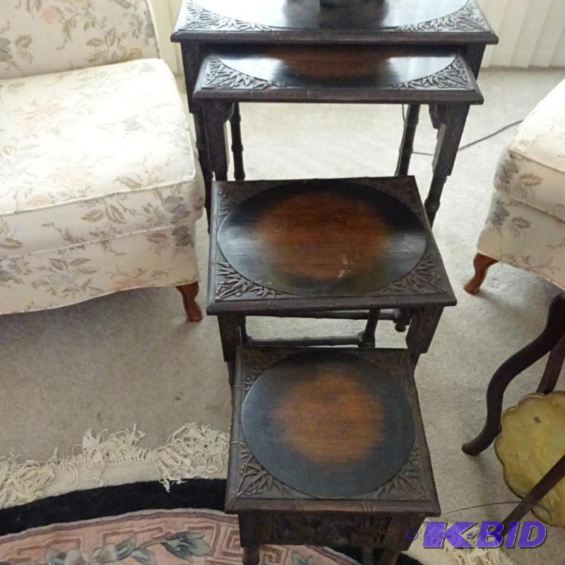 lot 6 image: Vintage wood Stack table set. Has Asian theme...