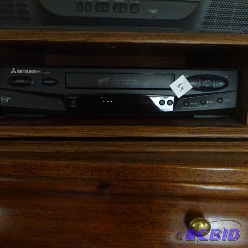 lot 64 image: Mitsubishi HS-U545 VCR. Powers on...
