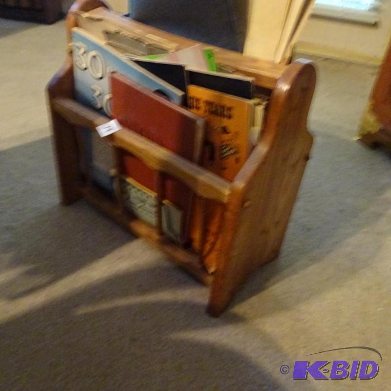 lot 79 image: wood magazine rack with lots of piano music....
