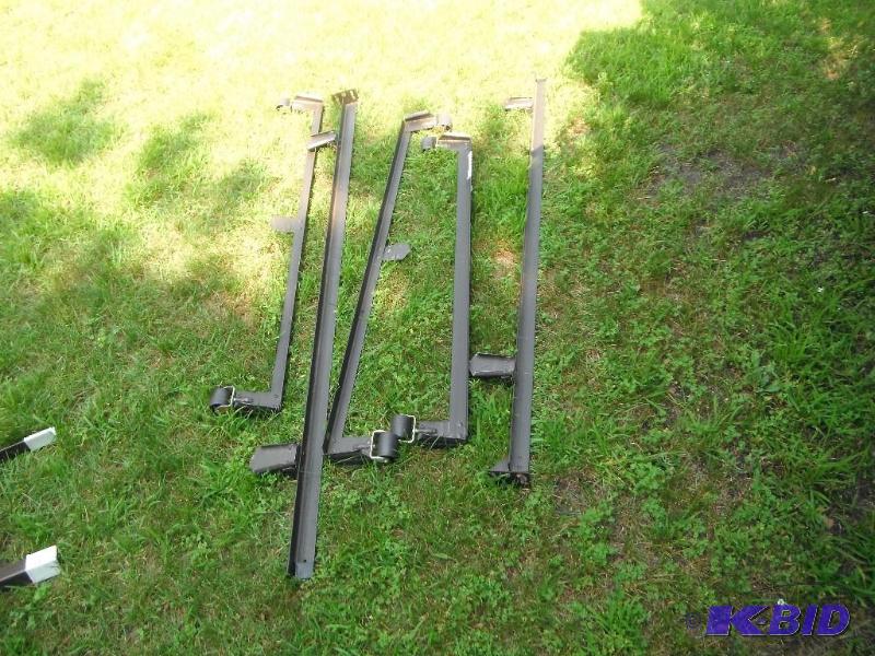 lot 105 image: King size metal bed frame with wheels...