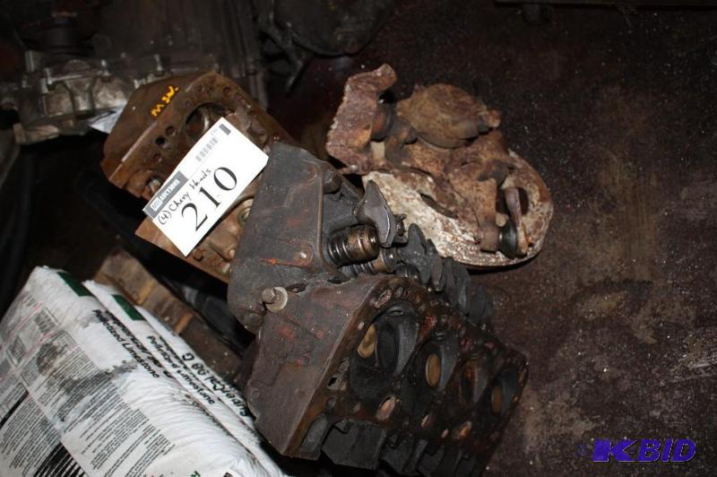 lot 210 image: Lot of (4) Chevy heads...