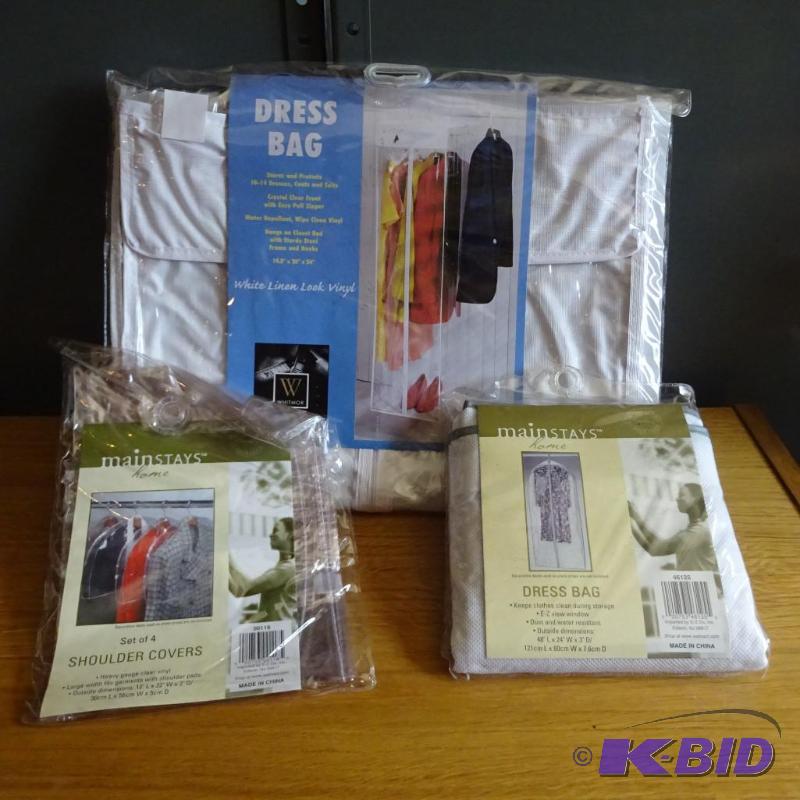 lot 126 image: Clothes Rack on Wheels with Dress Bags and mo...