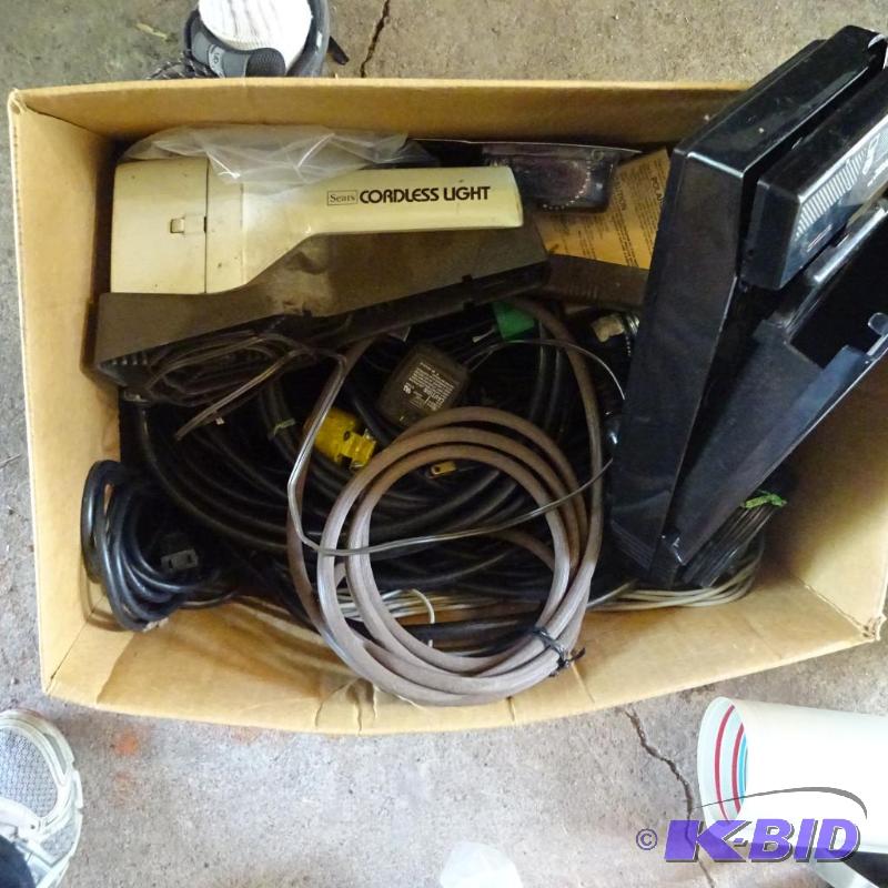 lot 210 image: Sear Cordless Lights. Box of Extension Cords...