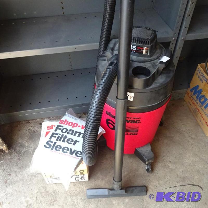 lot 74 image: 6 Gal. Shop Vac. Comes with new filters...