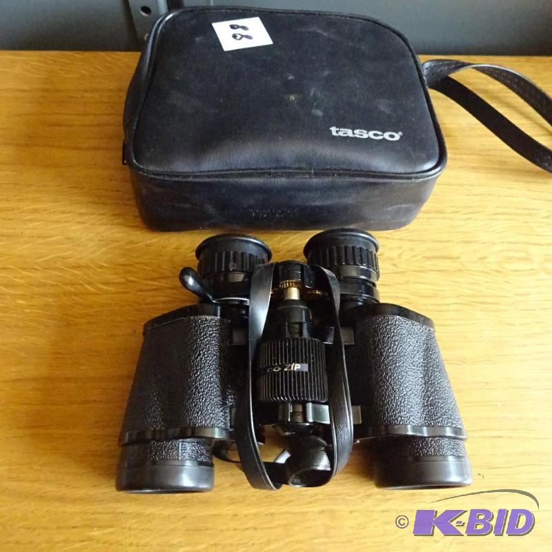 lot 88 image: Tasco 7x-15x35 Zoom Binochulars...