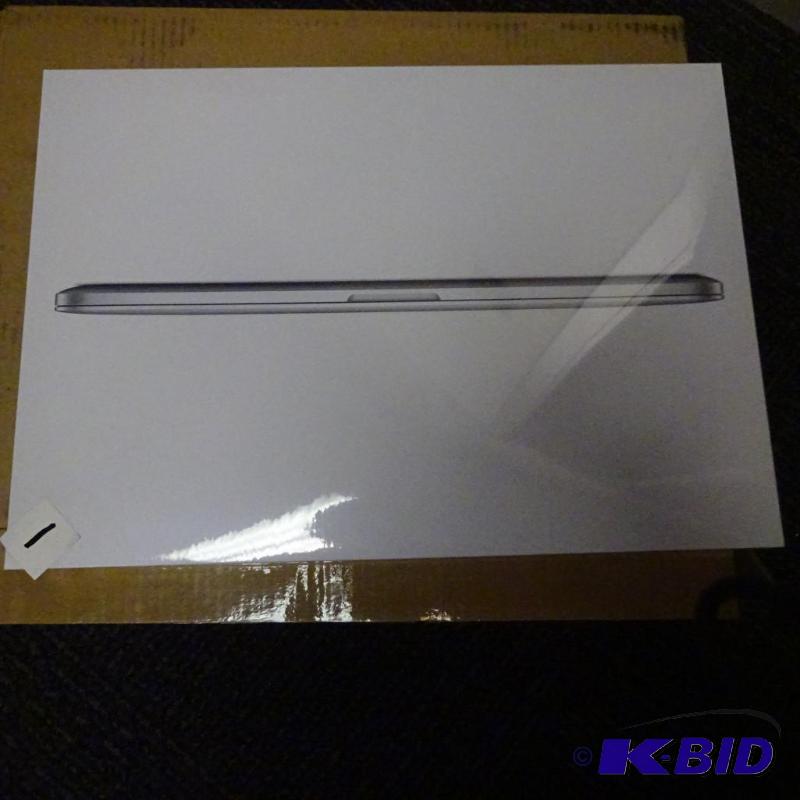lot 1 image: Brand new Mac book pro laptop. 15.4". 2....