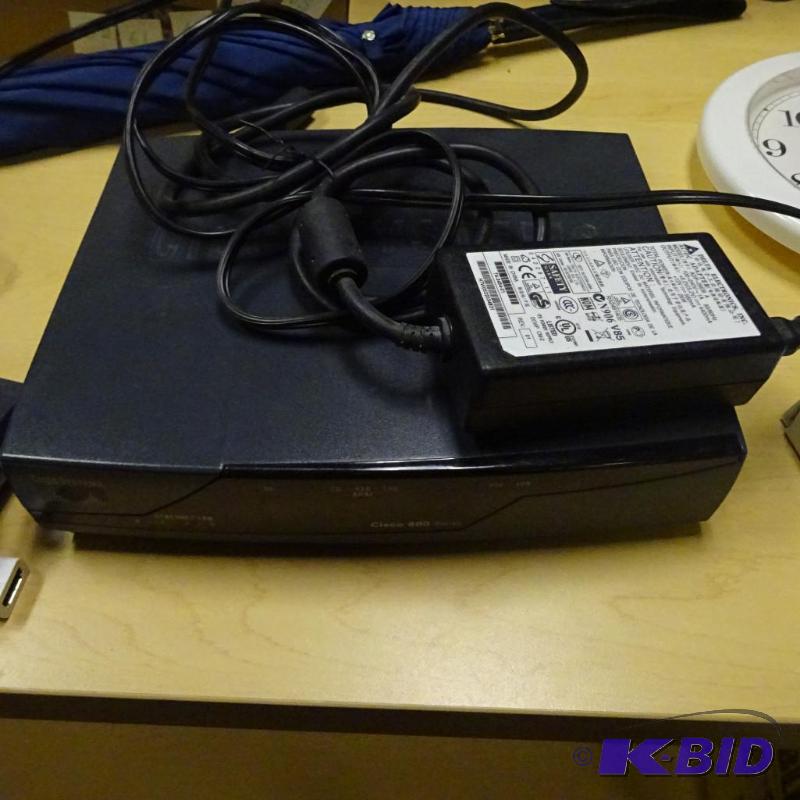 lot 120 image: Cisco 800 series router....