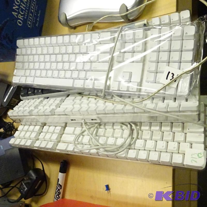 lot 131 image: 6 mac keyboards...