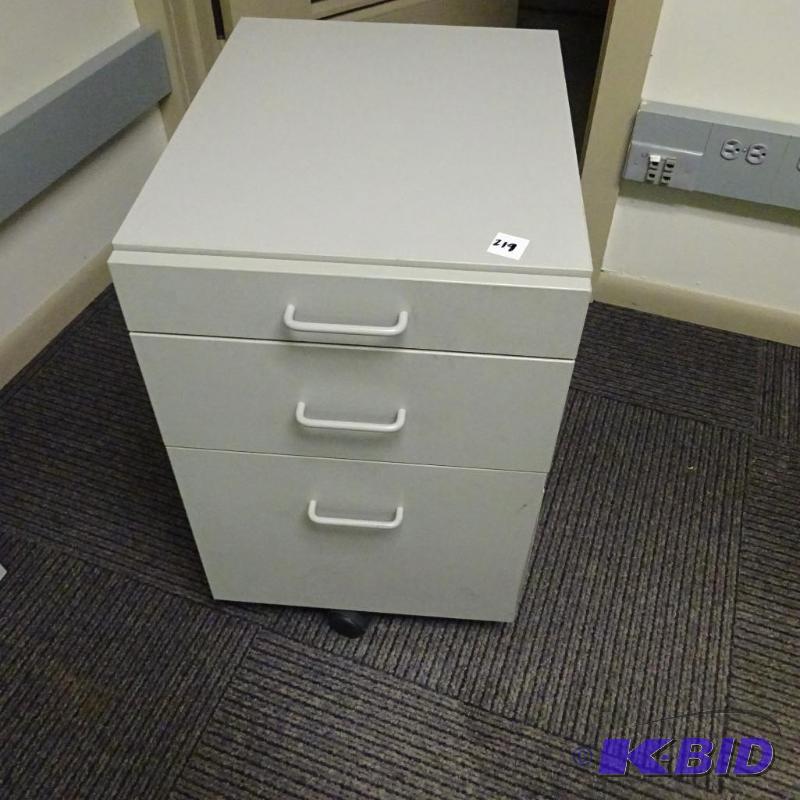 lot 219 image: Laminate 3 drawer ped on wheels...