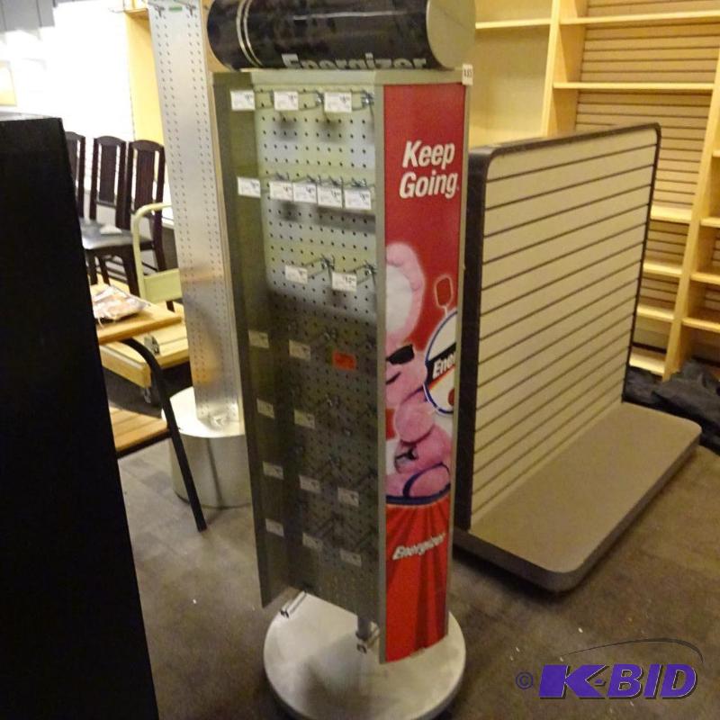 lot 255 image: Rotating peg board retail display. 20 x 60....