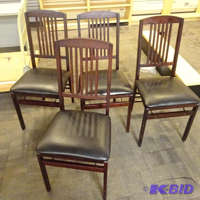 lot 27 image: 4 wood frame fold up chairs....