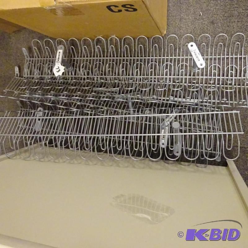 lot 73 image: Ikea metal retail racks. Wall mount. Qty 5...