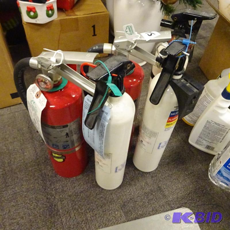 lot 75 image: 4 fire extinguishers. 2 are empty...