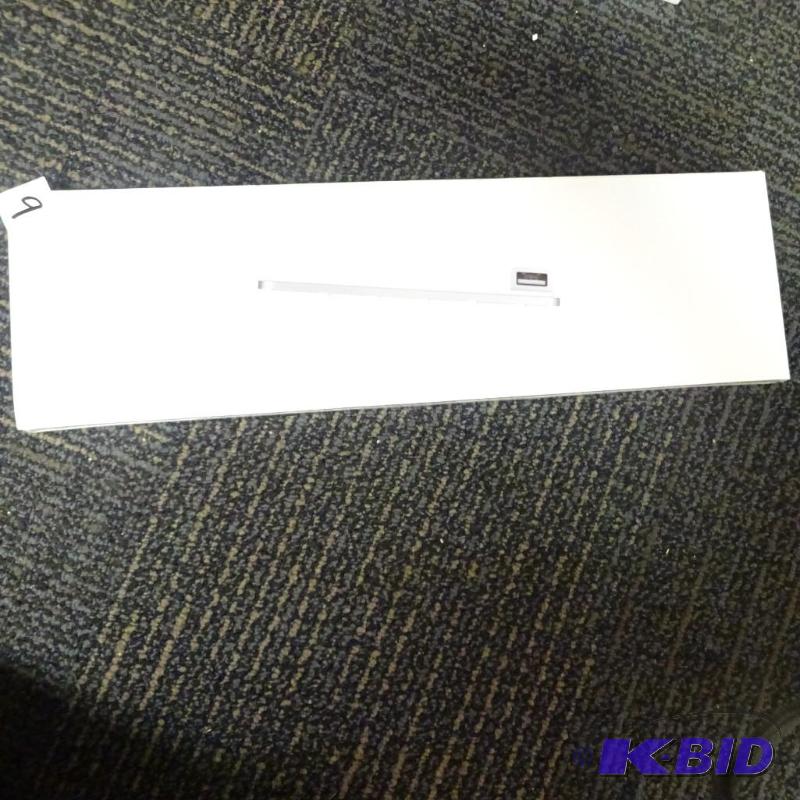 lot 9 image: Apple MB11DLLB Keyboard. New in factory seal...
