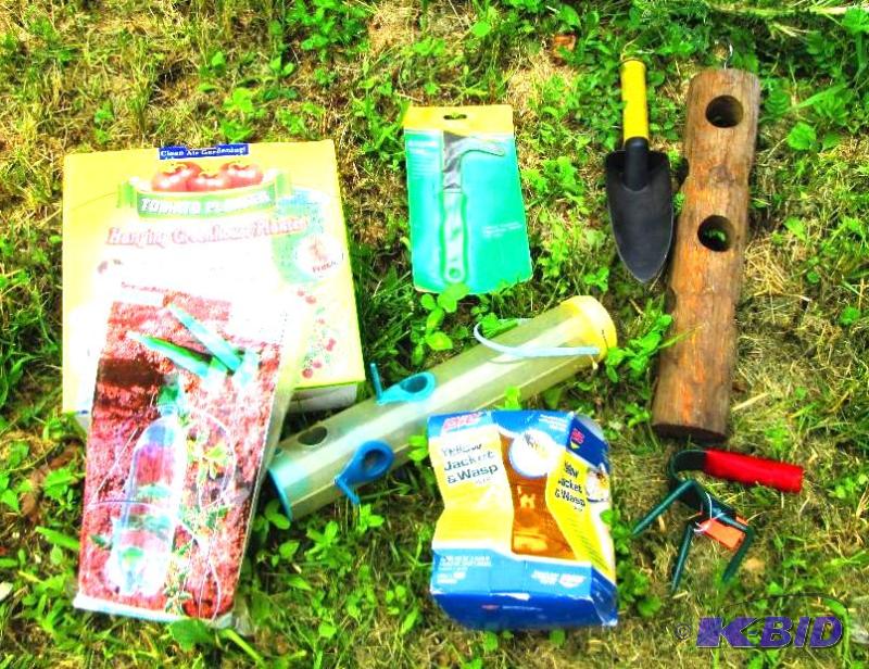 lot 104 image: Bird feeders, tomato hanging planter and wasp...