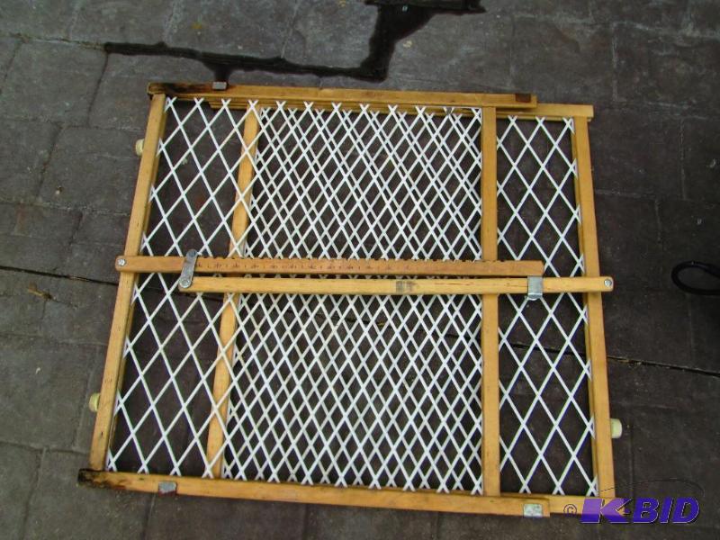 lot 109 image: wood frame baby gate...