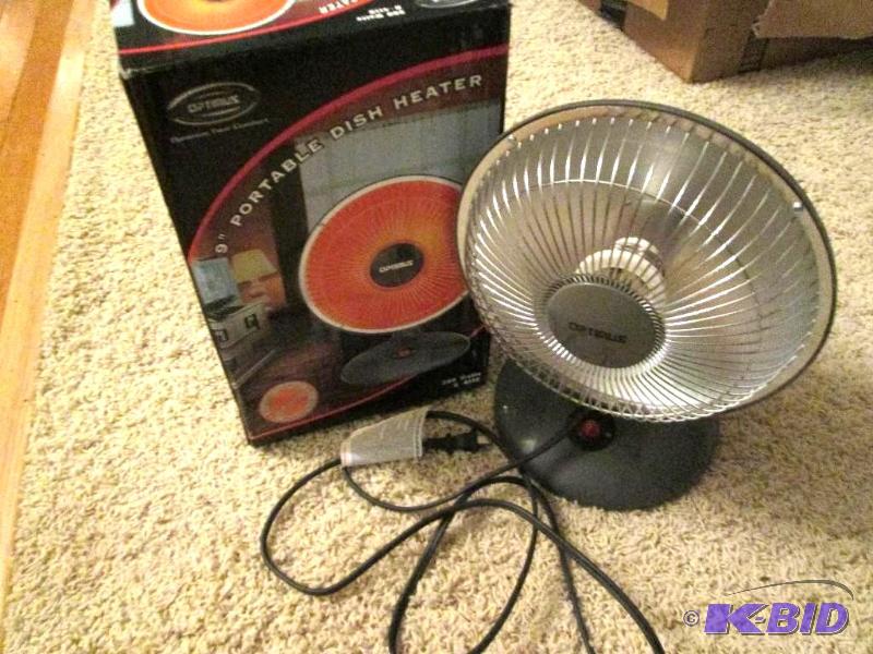 lot 138 image: 9 inch portable heater, new in box...