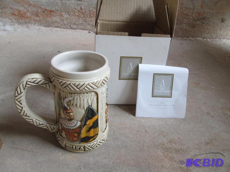 lot 15 image: Avon Stein, Collector mug in box...