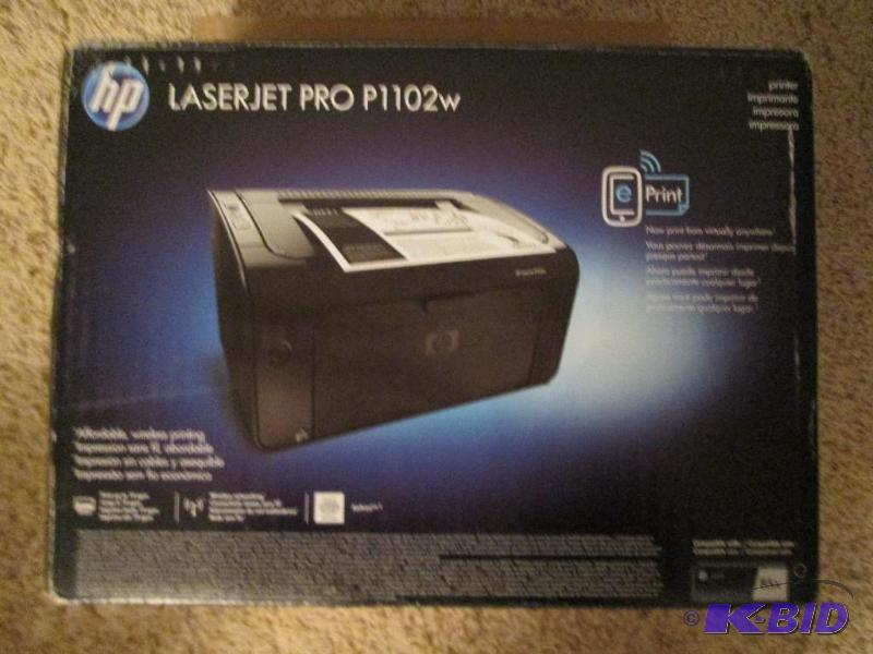 lot 157 image: HP Laserjet Pro P1102w printer, in factory bo...