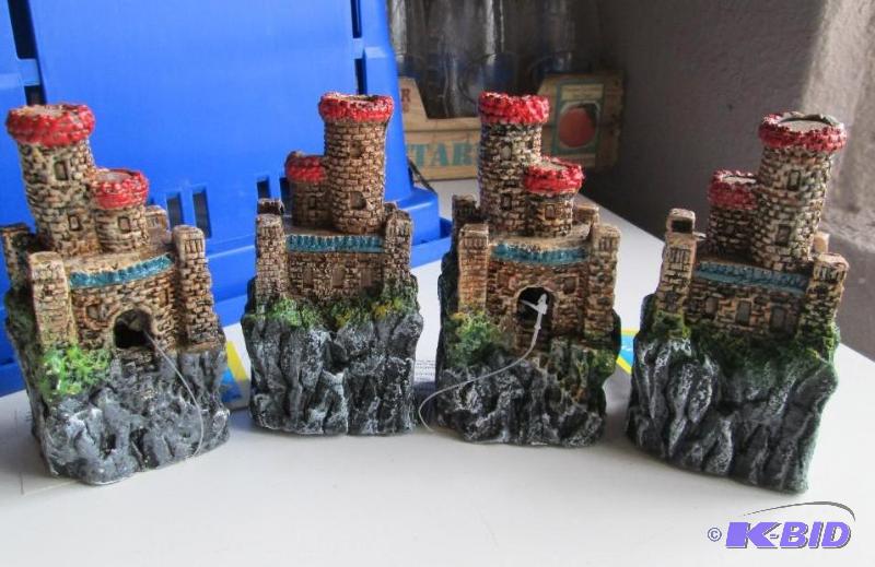 lot 215 image: Lot of 4 new resin castles for aquarium use....