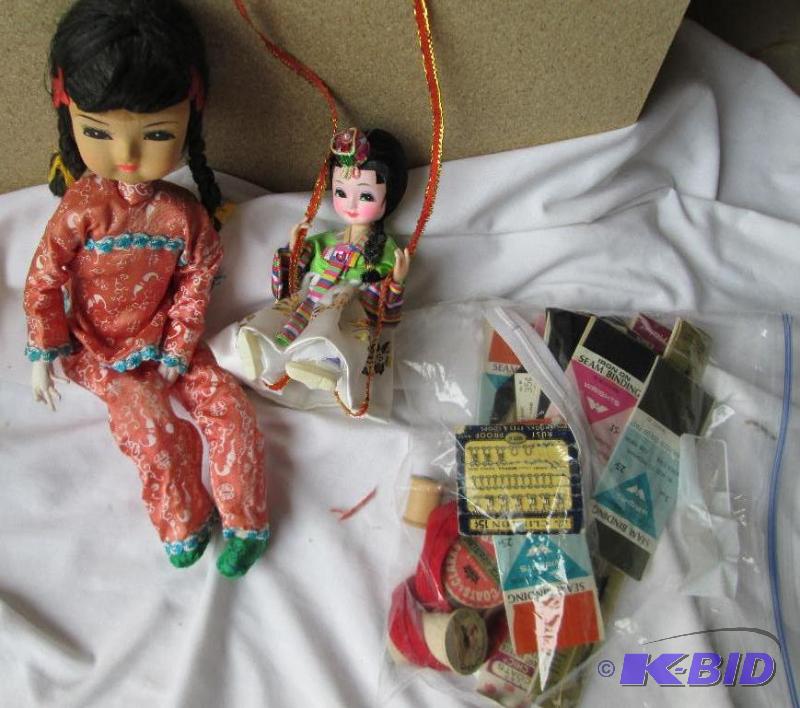 lot 32 image: Dolls with assorted sewing notions...