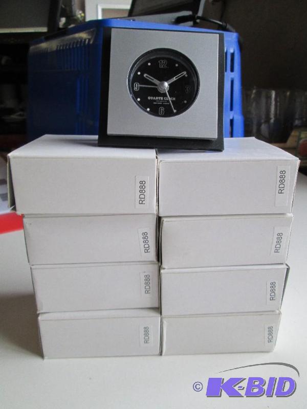 lot 41 image: Lot of 8 new battery operated quartz clocks. ...