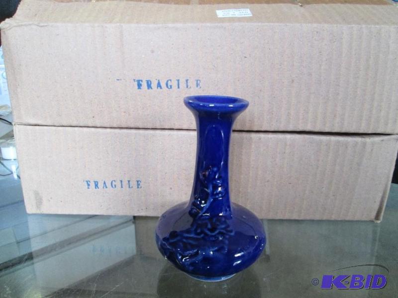 lot 415 image: 2 cases of small blue vases. Each case holds ...