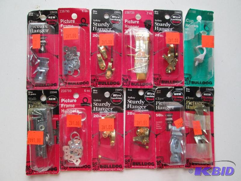 lot 48 image: Lot of 12 picture hangers new in original pac...