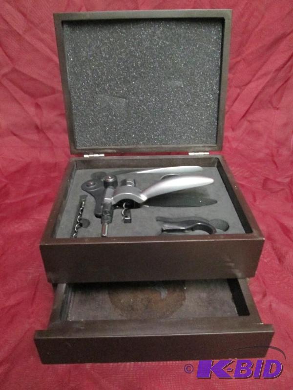 lot 497 image: Nice wine opening set with its own wooden ca...