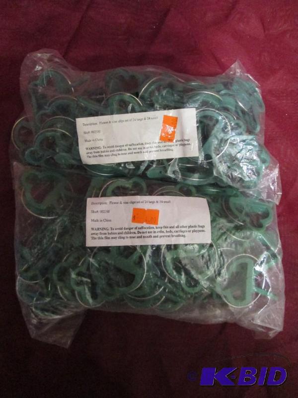 lot 501 image: Lot of flower and vine clips. Each bag contai...