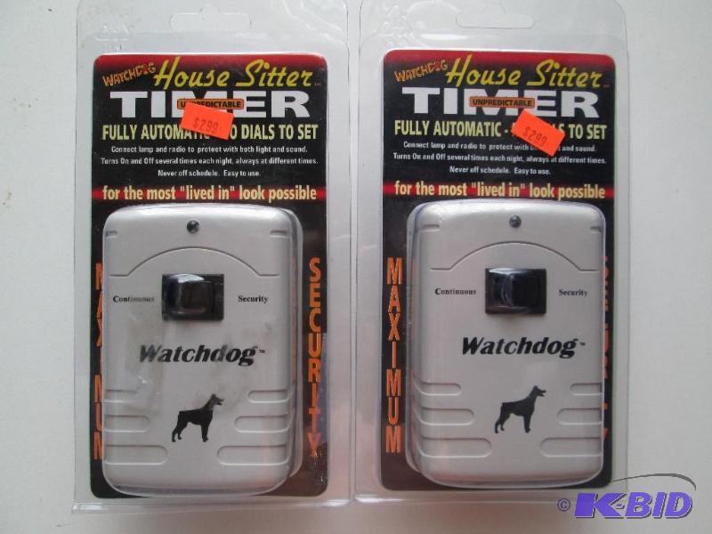 lot 55 image: Pair of Watchdog house sitter fully automat...