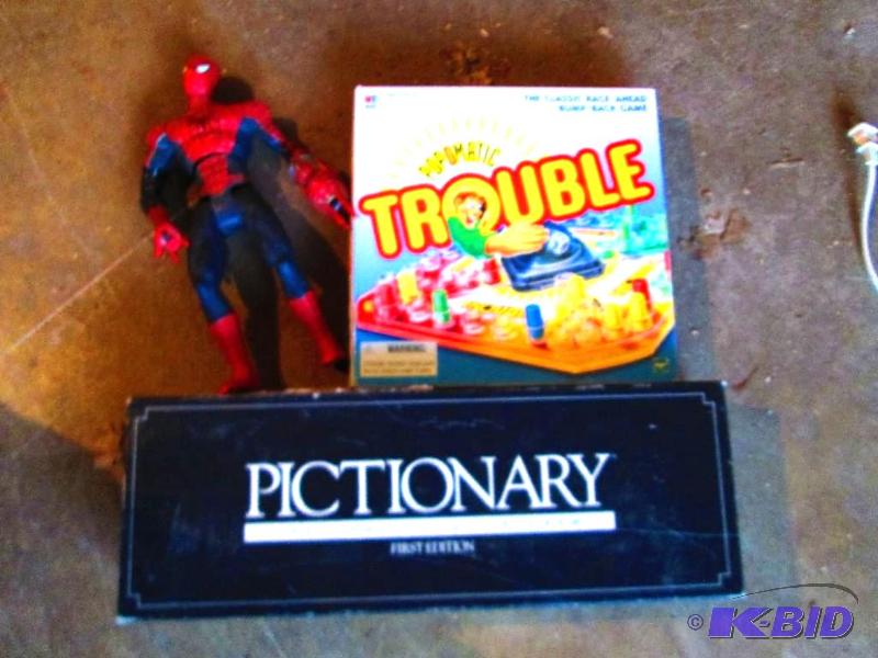 lot 67 image: Pictionary and Trouble board games with an ac...