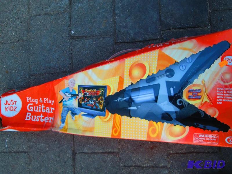 lot 93 image: Guitar Buster guitar game...