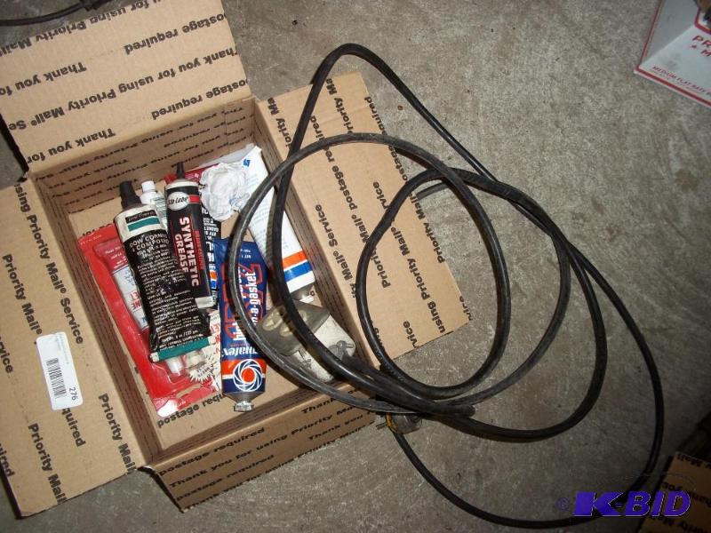 lot 276 image: Box of MIsc sealers, gasket material, extension cord