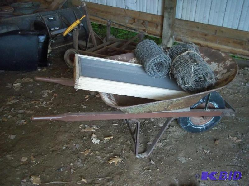 lot 43 image: Steel Wheel Barrow with window and chicken wire