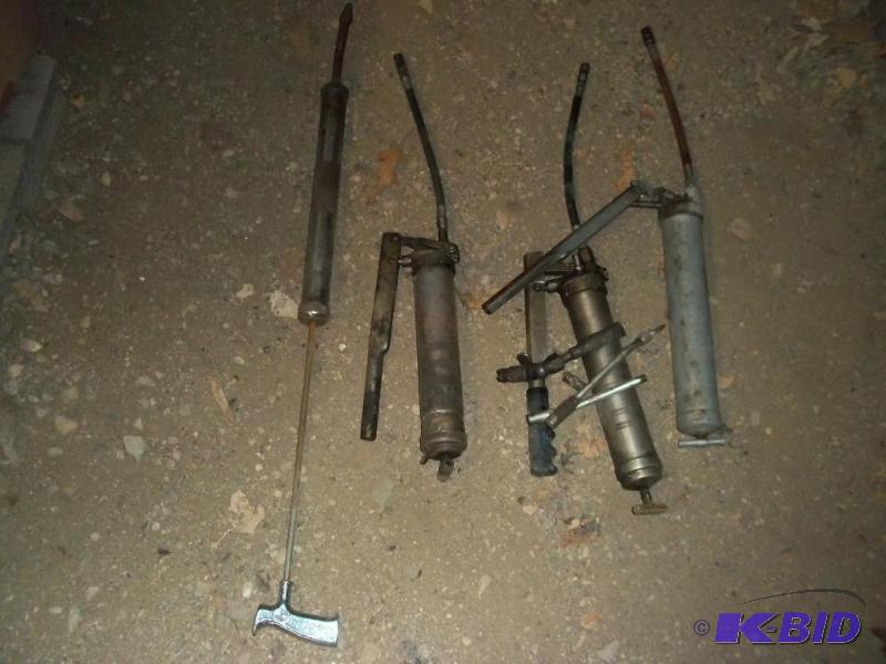 lot 55 image: 4 Grease Guns and Adapters