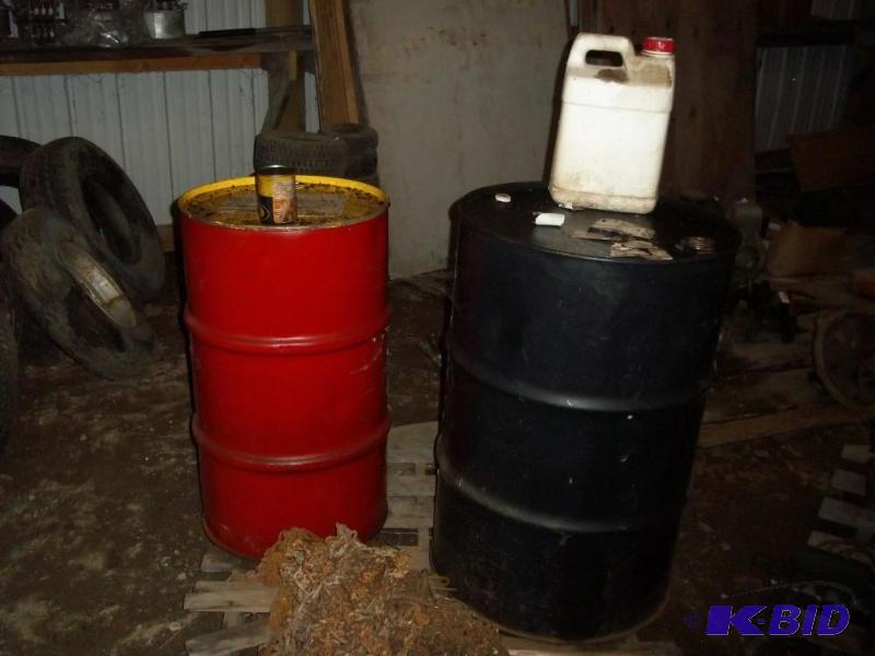 lot 82 image: 2 Barrels of oil   Cenex 15-40 13 full , Shell 10-30 14 full