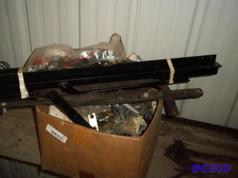 lot 87 image: Box of New Genie Garage Door Parts