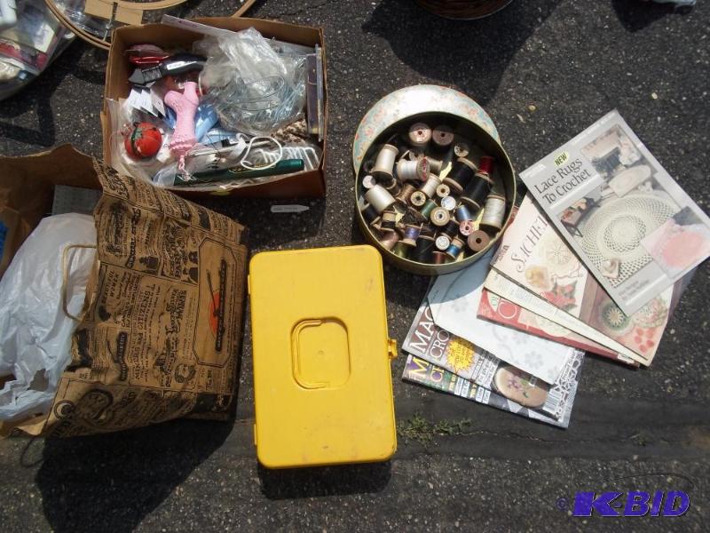 lot 233 image: Crochet patterns, wood thread spools and assorted craft items