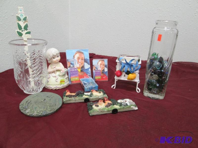 Glass vase with marbles in it, crystal top to...