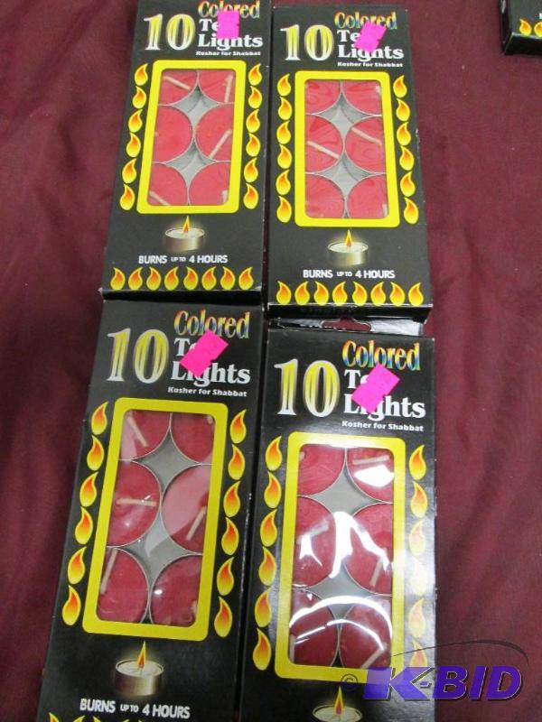 Qty 4 boxes of 10 colored tea lights burns up...