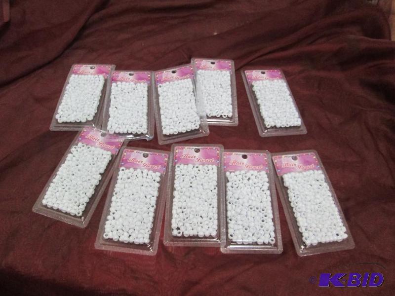 Qty 9 white hair beads...