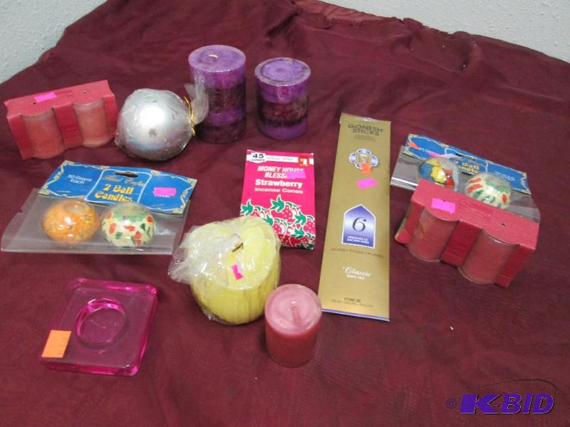 Qty 2 purple candles, yellow in the shape of ...