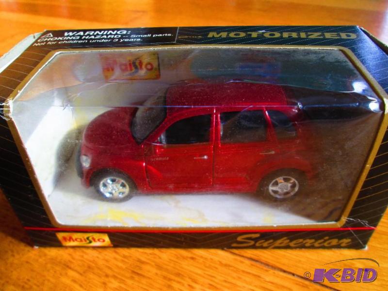 lot 111 image: Maisto Superior motorized PT Cruiser...