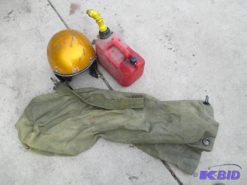 lot 152 image: helmet, amy bag, and a gas can...