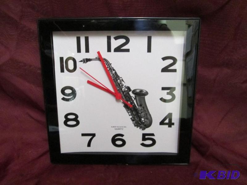 lot 21 image: New Albert Elowitz, Inc quartz clock featurin...
