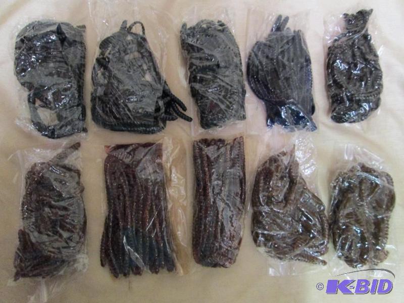 lot 216 image: Lot of 10 bags of 4 and 6 jig worms. Black ti...