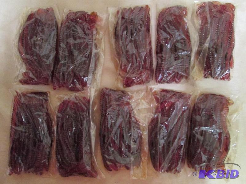 lot 218 image: Lot of 10 bags of 6 jig worms. Rootbeer in co...