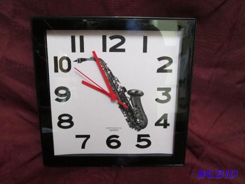 lot 22 image: New Albert Elowitz, Inc quartz clock featurin...